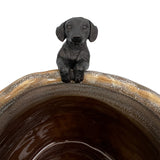 Charming dachshund-themed hanging ornament made of resin, 9.3cm tall, ideal for home or office decor.