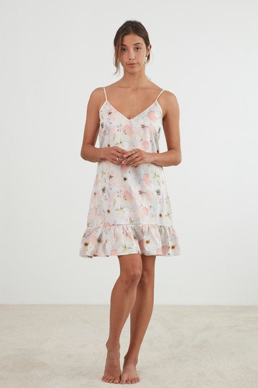 Blush pink sateen nightie with pressed flower design, 'v' neck, adjustable straps, and frilled hem, ethically made by BAKSANA.