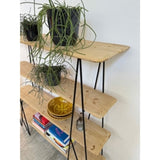 4 Tier Evie Shelving unit in solid wood and metal, perfect for displaying decor and organizing in compact spaces.