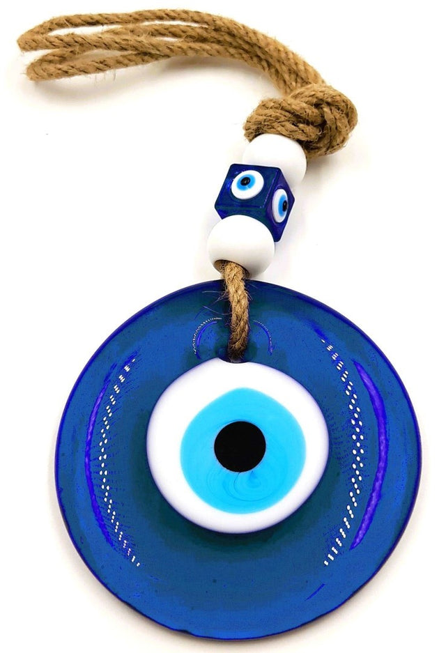 Set of 3 Turkish glass evil eye wall hangings featuring vibrant colors and unique designs, symbolizing protection and good fortune.