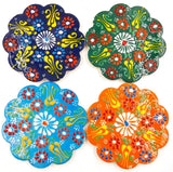 Set of 4 handpainted Turkish coasters, 12cm each, featuring unique vibrant patterns that protect surfaces beautifully.