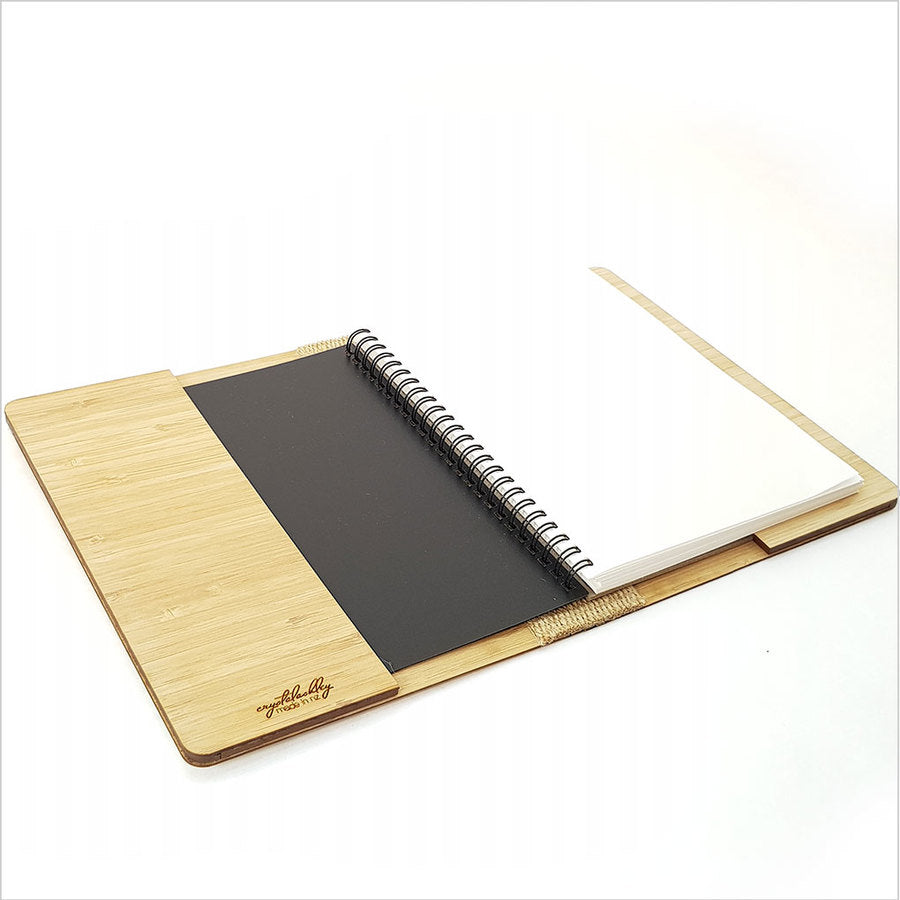 Eco-friendly bamboo notebook with tribal husky pattern, perfect for journaling or gifting, presented in a beautiful box.