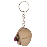 Assorted keyrings featuring intricate skull designs and roses, perfect for edgy keychains and gothic fashion lovers.