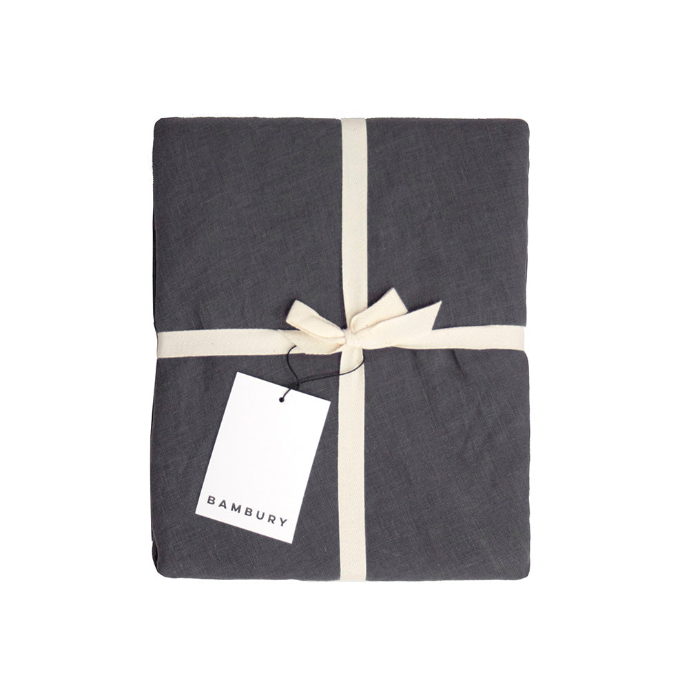 Linen Round Tablecloth in Charcoal, 228cm diameter, showcasing a luxurious, breathable fabric perfect for elegant dining occasions.