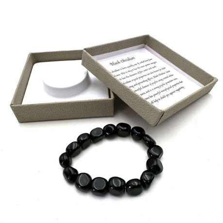 Large black obsidian beaded bracelet (14x11mm), elegant design with spiritual grounding and protection properties.