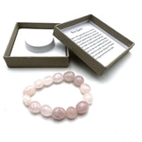 Large beaded bracelet featuring polished 14x11mm Rose Quartz beads, ideal for elegant everyday wear or special occasions.