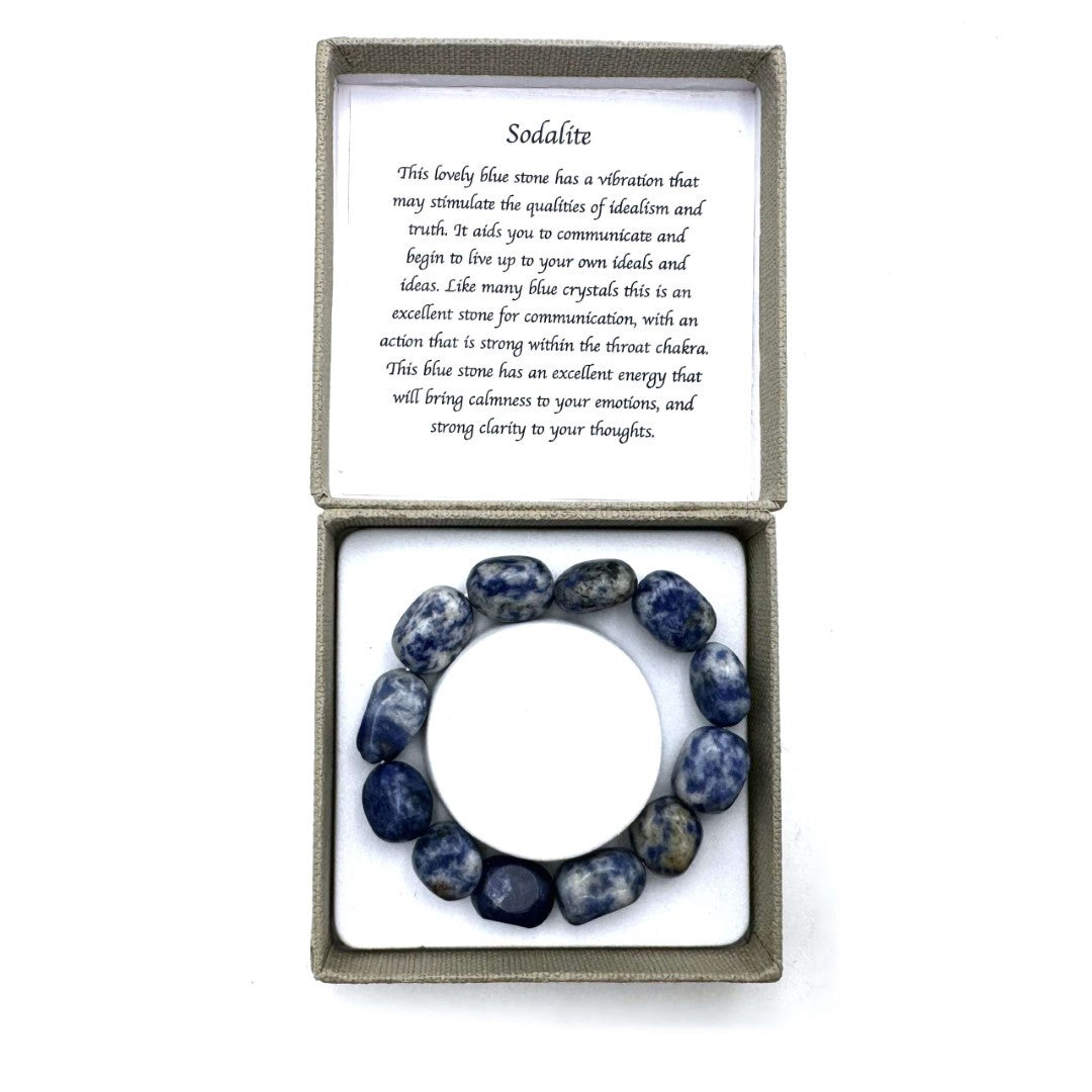 Large sodalite beaded bracelet with deep blue and white hues, measuring 14x11mm, promoting calmness and style.