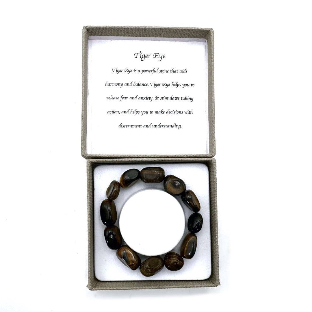 Large handcrafted Tiger Eye bracelet with bold 14x11mm beads, promoting confidence and adding elegance to any outfit.