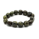 Large beaded bracelet made of Dragon Blood Jasper, featuring unique patterns in earthy tones and handcrafted for style and wellness.