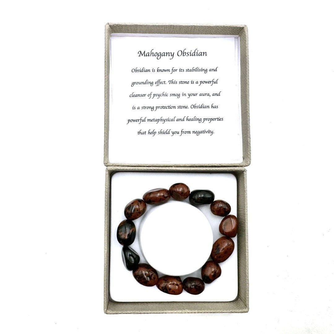 Large beaded bracelet made of polished Mahogany Obsidian, featuring 14x11mm beads for style and emotional healing.