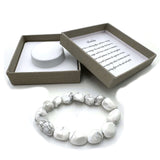 Large beaded bracelet made of American Howlite, featuring white and gray veined beads measuring 14 x 11mm.