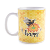 Ceramic mug featuring a cheerful bee design on a golden honeycomb background, perfect for uplifting your morning routine.