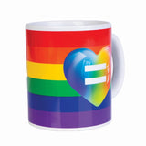 Vibrant ceramic coffee mug featuring a rainbow heart design, perfect for celebrating LGBTQ+ pride and diversity.