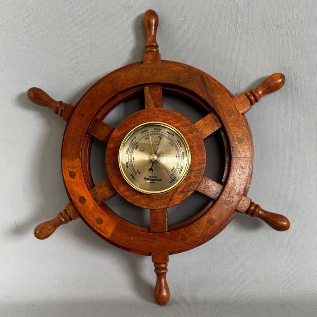 Teak Ships Wheel Barometer (35cm) - Elegant maritime decor that measures atmospheric pressure, crafted from premium teak wood.