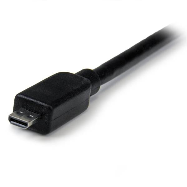 Micro HDMI to VGA adapter connecting devices, offering 1080p video output and audio support for seamless streaming and presentations.