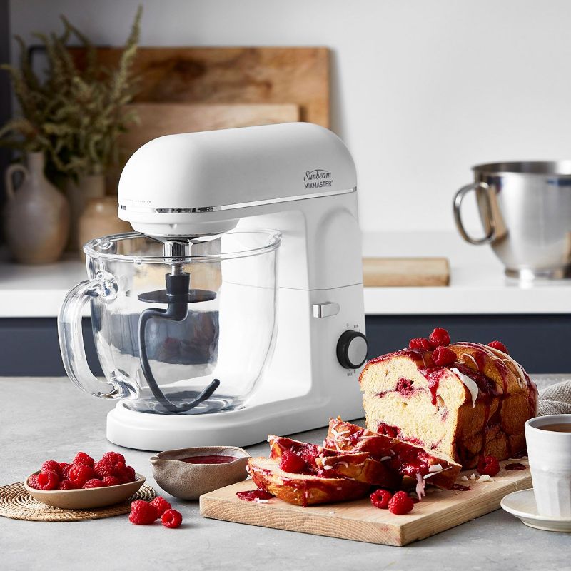 Sunbeam Stand Mixer in white, featuring 850W power, 5L bowl, 8 speeds, and essential mixing accessories for versatile baking.