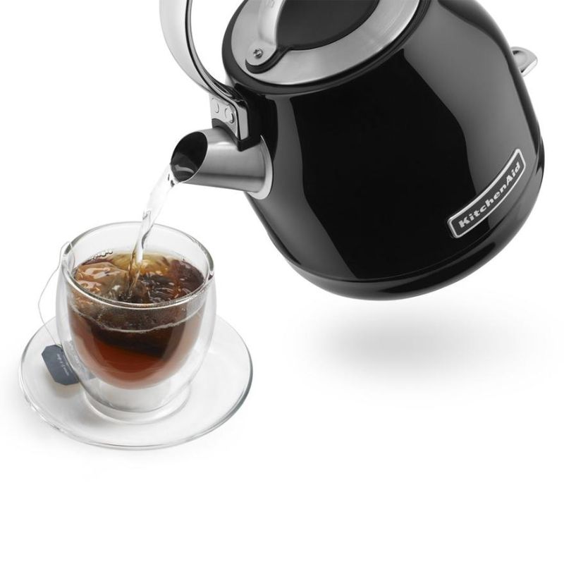 Stylish KitchenAid Artisan Electric Kettle in Onyx Black, 1.25L, features a stainless steel body, 360° base, and easy-pour spout.