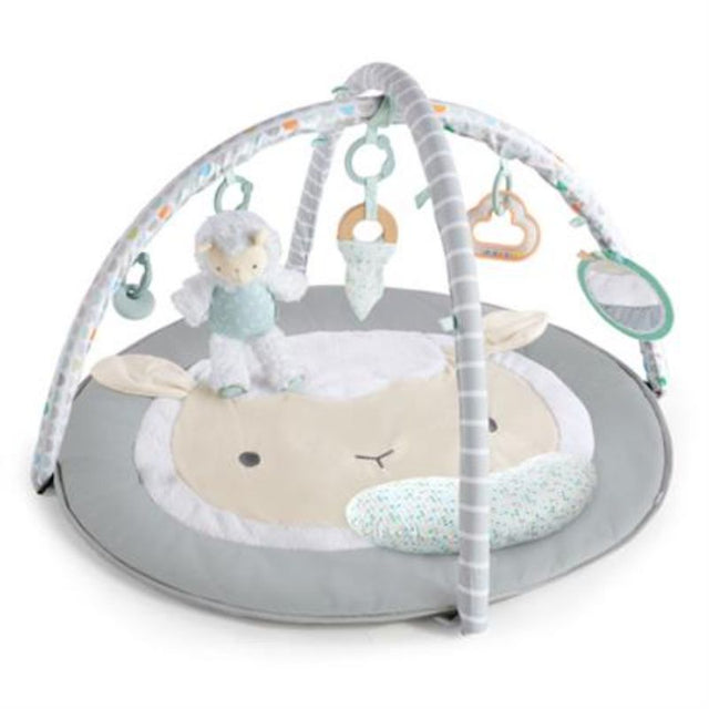 Soft plush activity gym featuring removable toys, tummy-time pillow, and a cozy mat for infants' play and development.