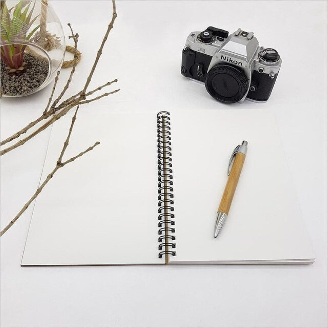 Eco-friendly small bamboo journal featuring Riverwood Rimu design, 110gsm paper, ideal for writing and sketching.