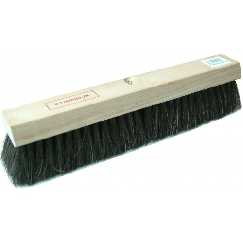 Durable 18" wooden broom head with medium soft Coco fiber, perfect for smooth surfaces in garages and workshops.