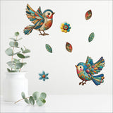 Colorful laser-cut birds in patchwork design, perfect for enhancing wall art and home decor.