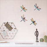 Vibrant pop-out dragonfly wall art set, crafted from durable textured board, perfect for whimsical bedroom decor.