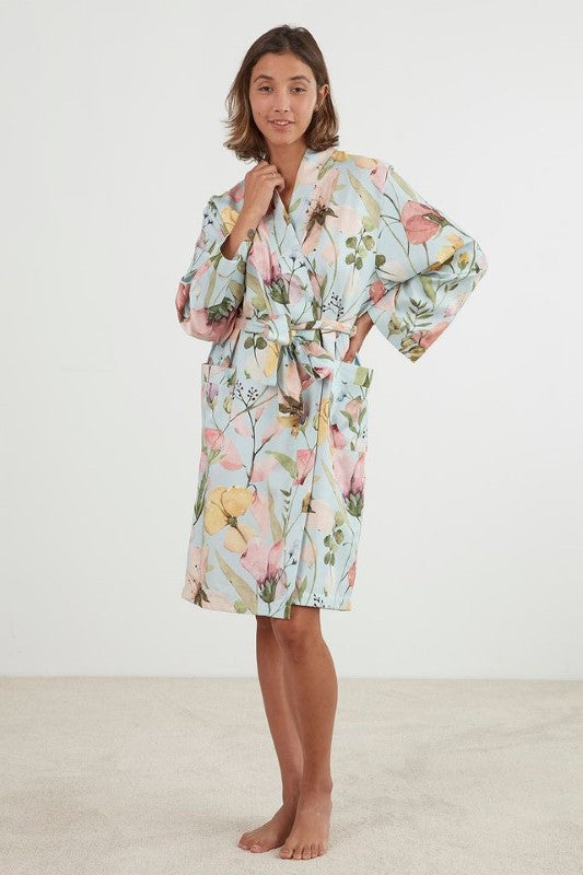 Blue kimono robe with spring flower print, featuring two pockets and a waist tie, made from 100% cotton sateen.