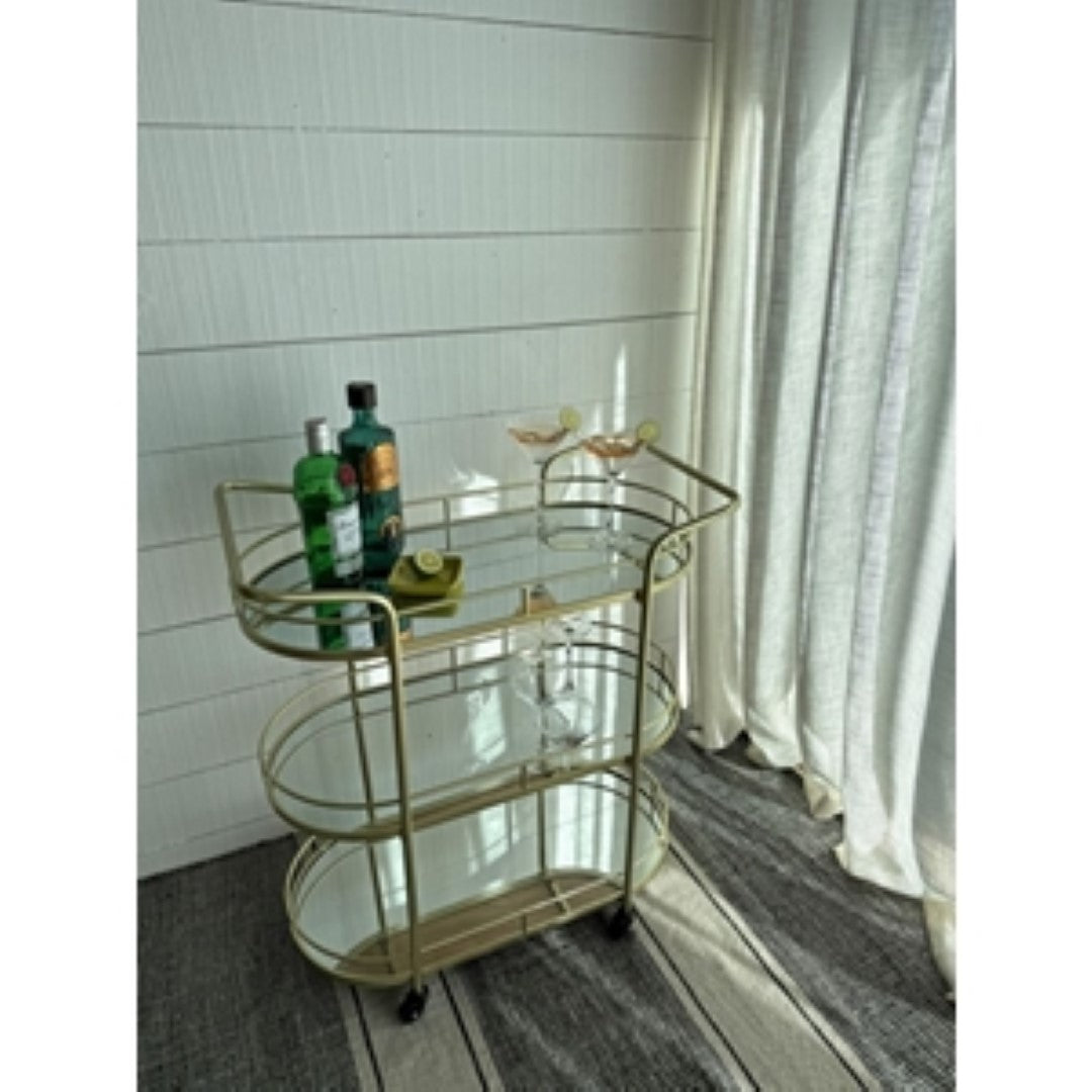 Elegant gold mirrored bar trolley with 3 tiers, smooth-rolling castors, and stylish handles for effortless serving.