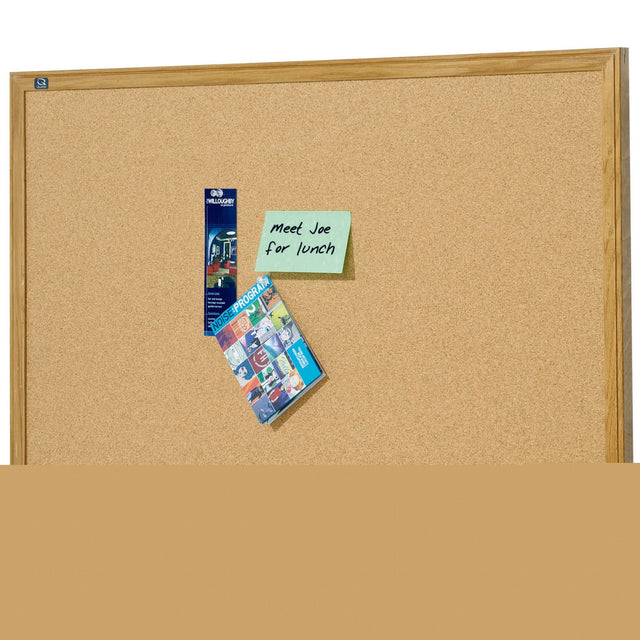 Elegant oak-framed corkboard (1200x900mm) for organized displays of notes and reminders in homes or offices.