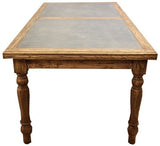 Rustic dining table with antique zinc top and reclaimed elm base, ideal for modern and traditional dining areas.