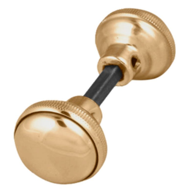 Brass-plated spare knobs and spindle set for rim locks, ensuring durability and style.