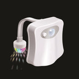 Color-changing LED toilet light with motion sensor, creating a vibrant disco atmosphere in any bathroom.