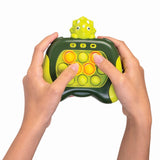 Handheld Dino Island push and pop game with vibrant colors, satisfying buttons, 100+ levels, and four game modes.