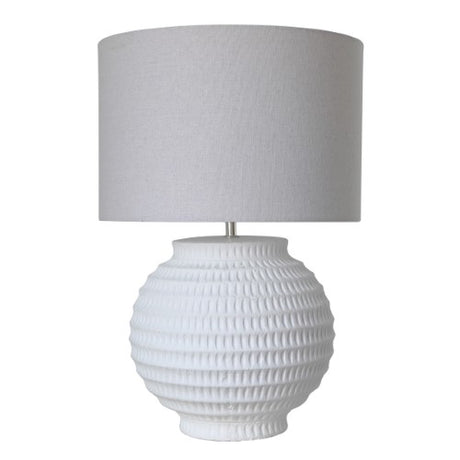 Elegant white terracotta lamp with a soft linen shade, perfect for creating a cozy ambiance in any room.