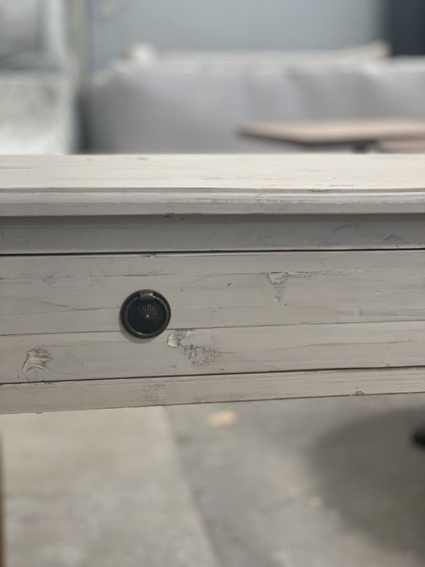 Cream distressed pine console table with single drawer, perfect for stylish storage and vintage charm in any living space.