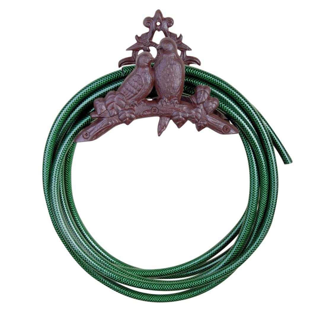 Handcrafted cast iron hose holder featuring two birds on a branch, ideal for organizing hoses while enhancing garden decor.