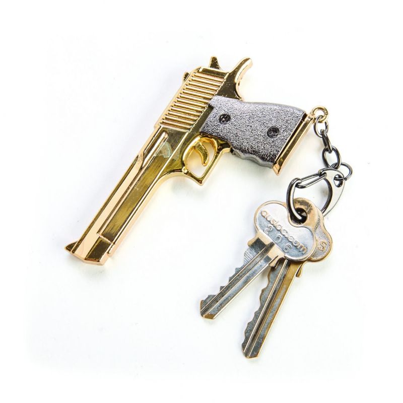 Set of 6 realistic metal gun keychains, stylishly designed to secure keys while showcasing unique firearm enthusiast flair.