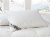 Luxurious BAKSANA pillow featuring 95% Hungarian goose down for optimal softness and support, ethically made in Hungary.