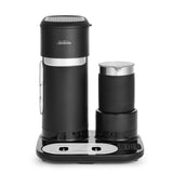 Sunbeam Iced + Hot Coffee Maker brews rich hot or iced coffee, includes frother, tumbler, and filters for versatile drinks.