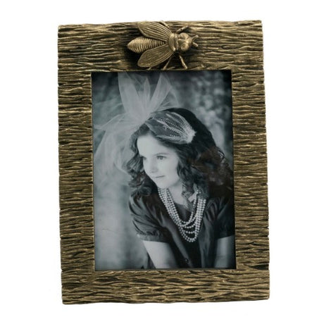 Elegant gold bee photo frame (5x7") showcasing cherished memories with unique bee accents and durable craftsmanship.