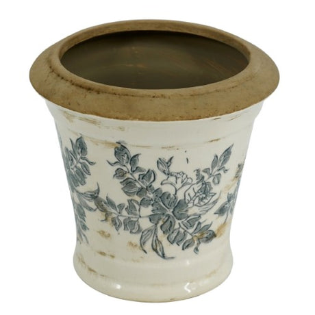 Vintage vase with intricate patterns and antique-inspired design, featuring a white and floral color palette.