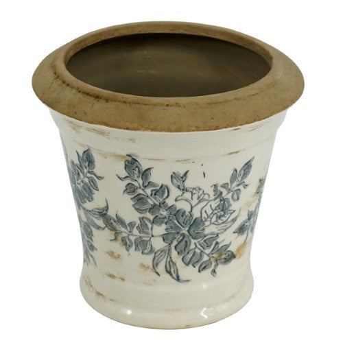 Vintage vase with intricate patterns and antique-inspired design, featuring a white and floral color palette.