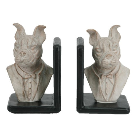 Charming cement dog bookends in white and black, perfect for organizing books with playful decor for dog lovers.