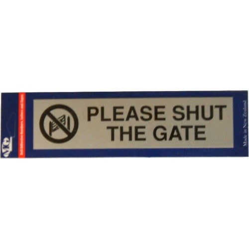 Self-adhesive aluminum sign saying "Please Shut The Gate," durable for indoor and outdoor use, promoting safety and order.