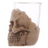 Set of 6 mini skull shot glasses, 7cm tall, perfect for Halloween parties and unique barware.