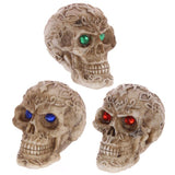 Set of 12 Mini Celtic Skull ornaments with vibrant gem eyes, featuring intricate designs for unique home or Halloween decor.