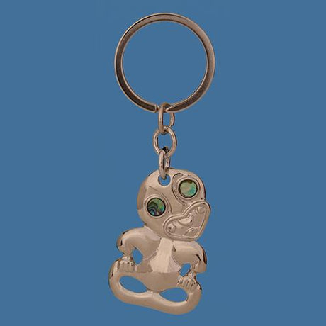 Paua Tiki Keyring featuring vibrant paua shell eyes, symbolizing ancestry and good luck, ideal for keys or gifting.