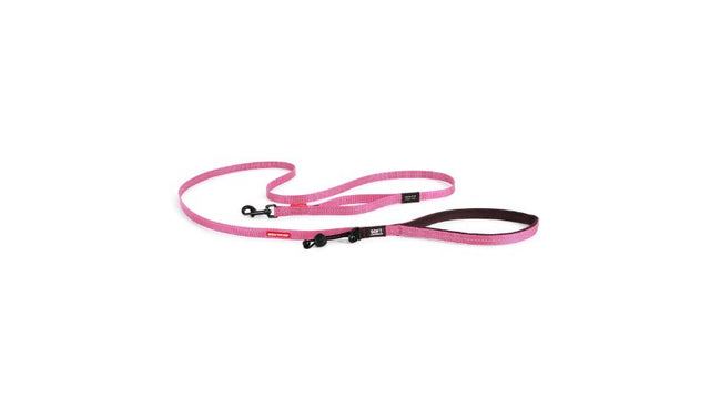 Lightweight pink leash for small dogs under 12kg, featuring soft webbing, reflective trim, and a barrel lock for waste bags.