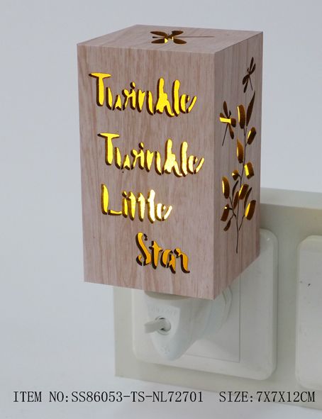 LED Wood Night Light in star design, emitting a soft glow for tranquil bedroom or nursery ambiance, measuring 7x7x10 inches.