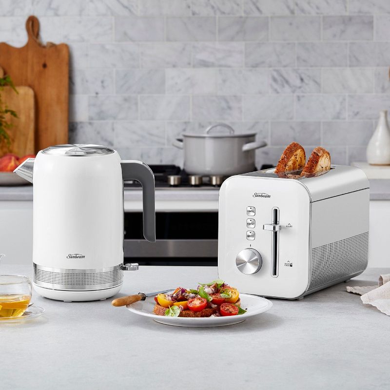 Sleek white 2-slice toaster with 9 browning settings, high lift lever, and removable crumb tray for easy use and cleanup.